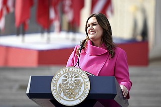 FILE - Arkansas Gov. Sarah Huckabee Sanders speaks after taking the oath of office, Jan. 10, 2023, in Little Rock, Ark. Sanders' office potentially violated state laws on purchasing state property and government records when it purchased a $19,000 lectern for the Republican governor that's prompted nationwide scrutiny, an audit requested by lawmakers said Monday, April 15, 2024. (AP Photo/Will Newton, File)